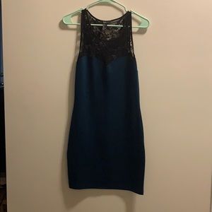 Green dress with black lace detail